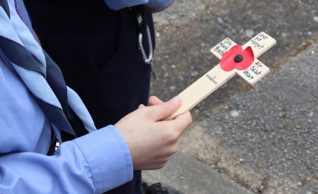 May be an image of 1 person, measuring stick and text